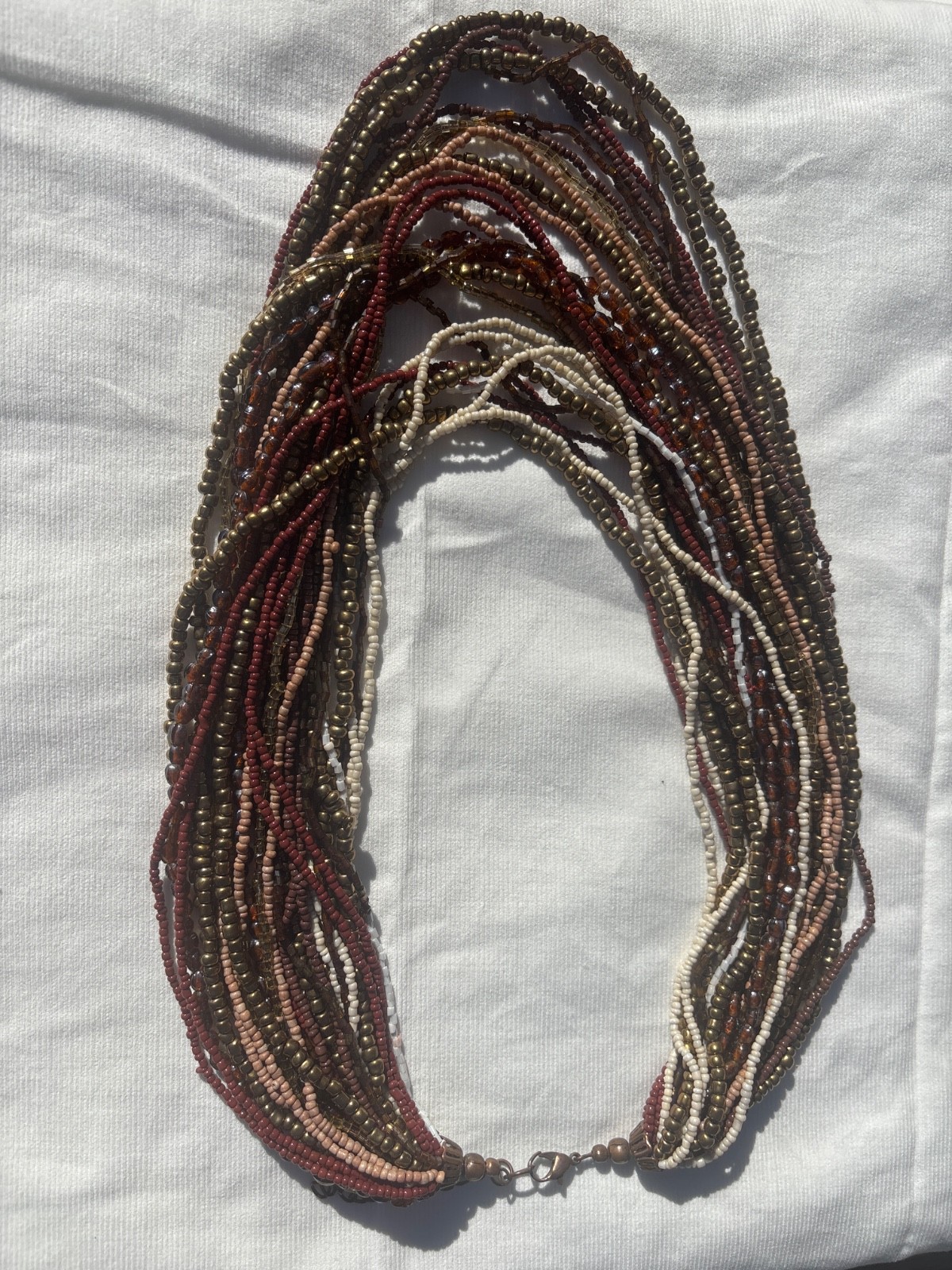 Multi strand necklace /women /glass/ fall colors/size 19”-24”/worn once/ lovingl