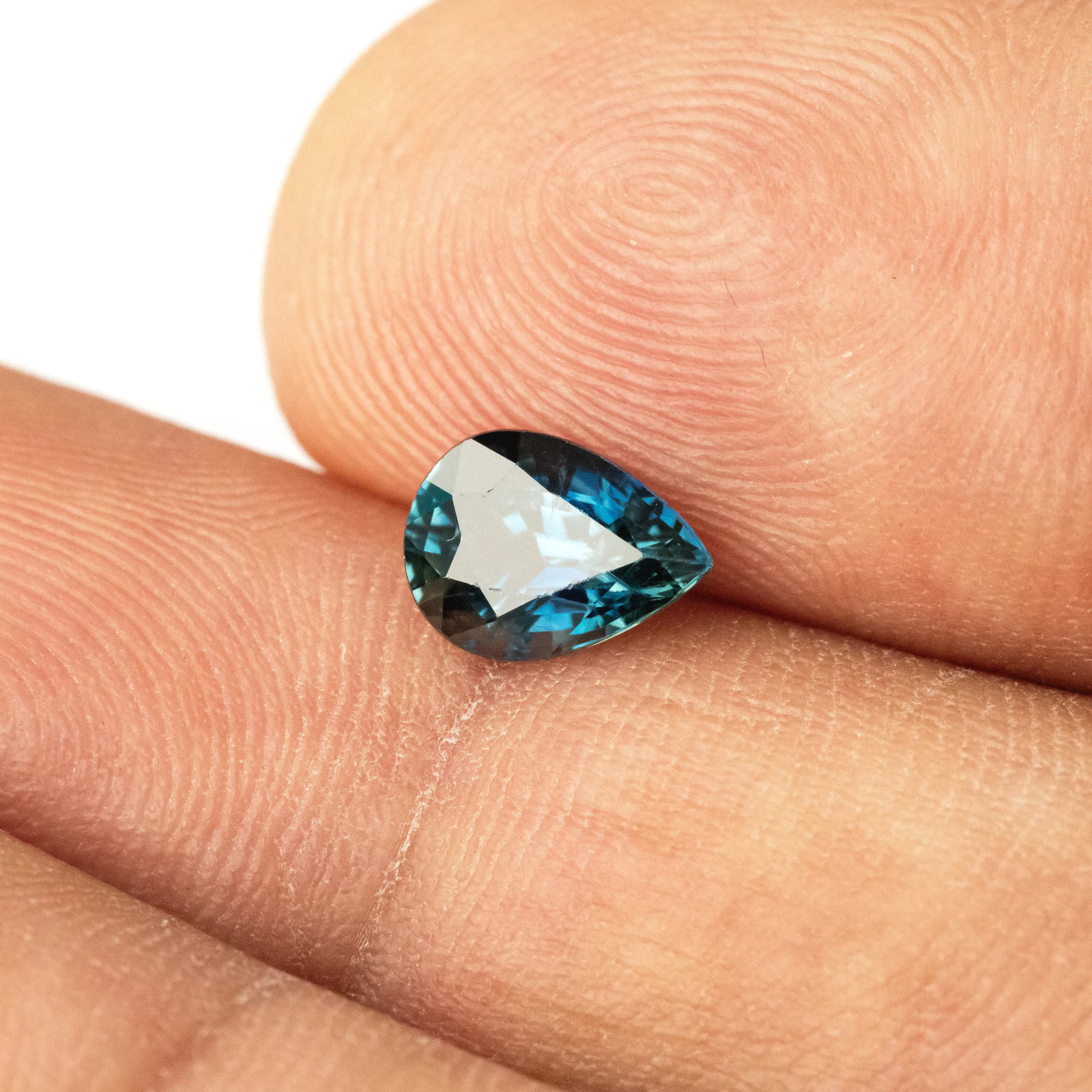 1.35ct Pear Shape Heated Natural Sapphire in Teal Green Peacock Blue Color