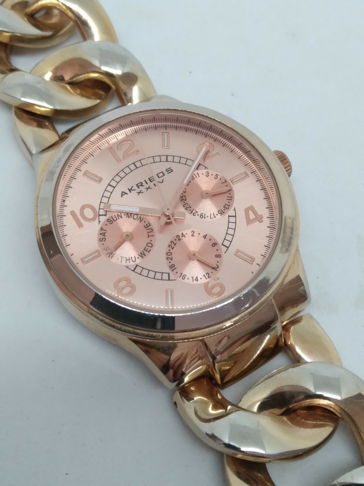 Akribos XXIV AK531RG Women’s 38mm Rose Tone Crystal Accent Multifunction Watch