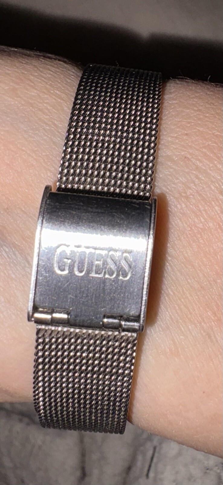 1996 GUESS numberless face watch. silver w adjustable mesh band. new battery.
