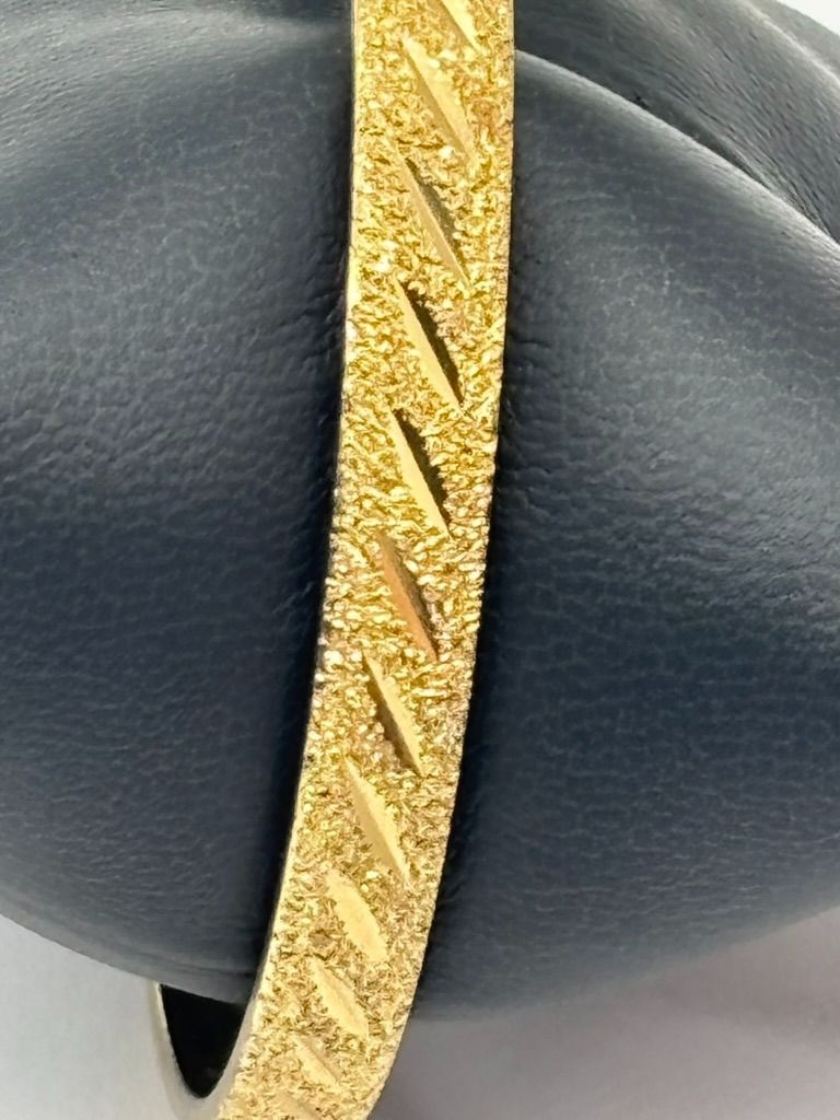 Vintage Monet Etched Textured and Shiny Gold-Tone Bangle Bracelet Signed 8-1/8″