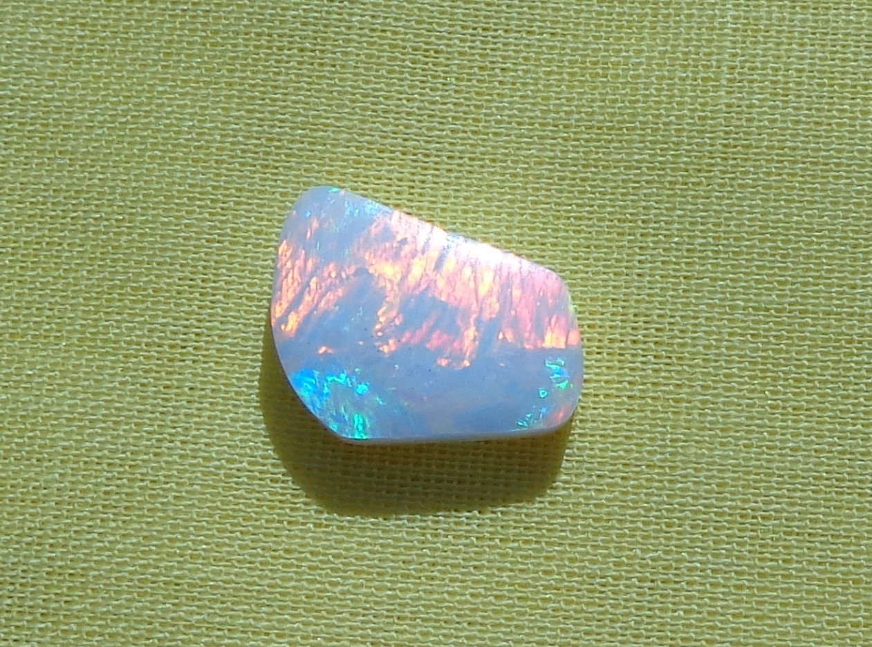Spencer Idaho Opal Solid 9X15 mm with Unique Pattern and Red, Green, & Gold Fire