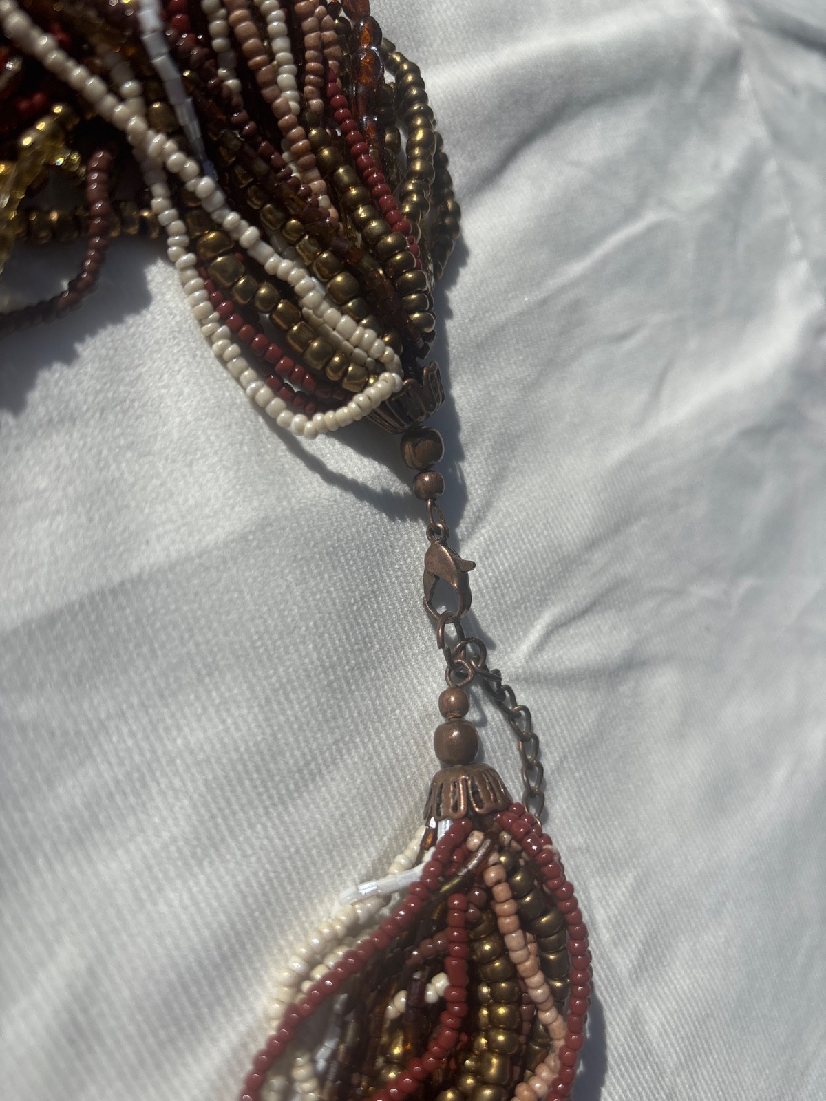 Multi strand necklace /women /glass/ fall colors/size 19”-24”/worn once/ lovingl