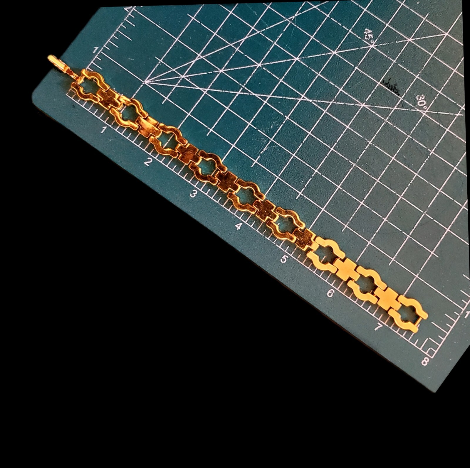7.5″ PVD Gold Tone Cross Hidden Bar Link Bracelet with Fold over Link Clasp