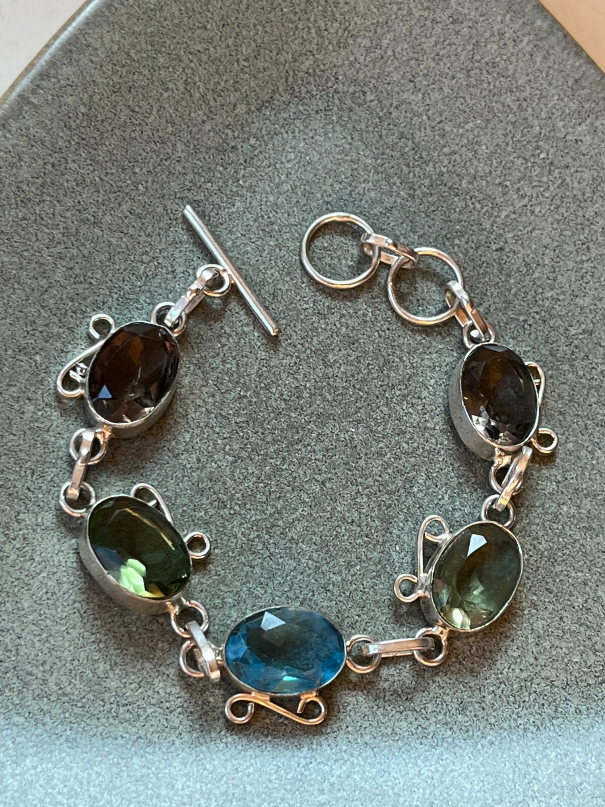 Brown Green & Blue Oval Faceted Glass in Nonmagnetic Silver Frame LInk Bracelet