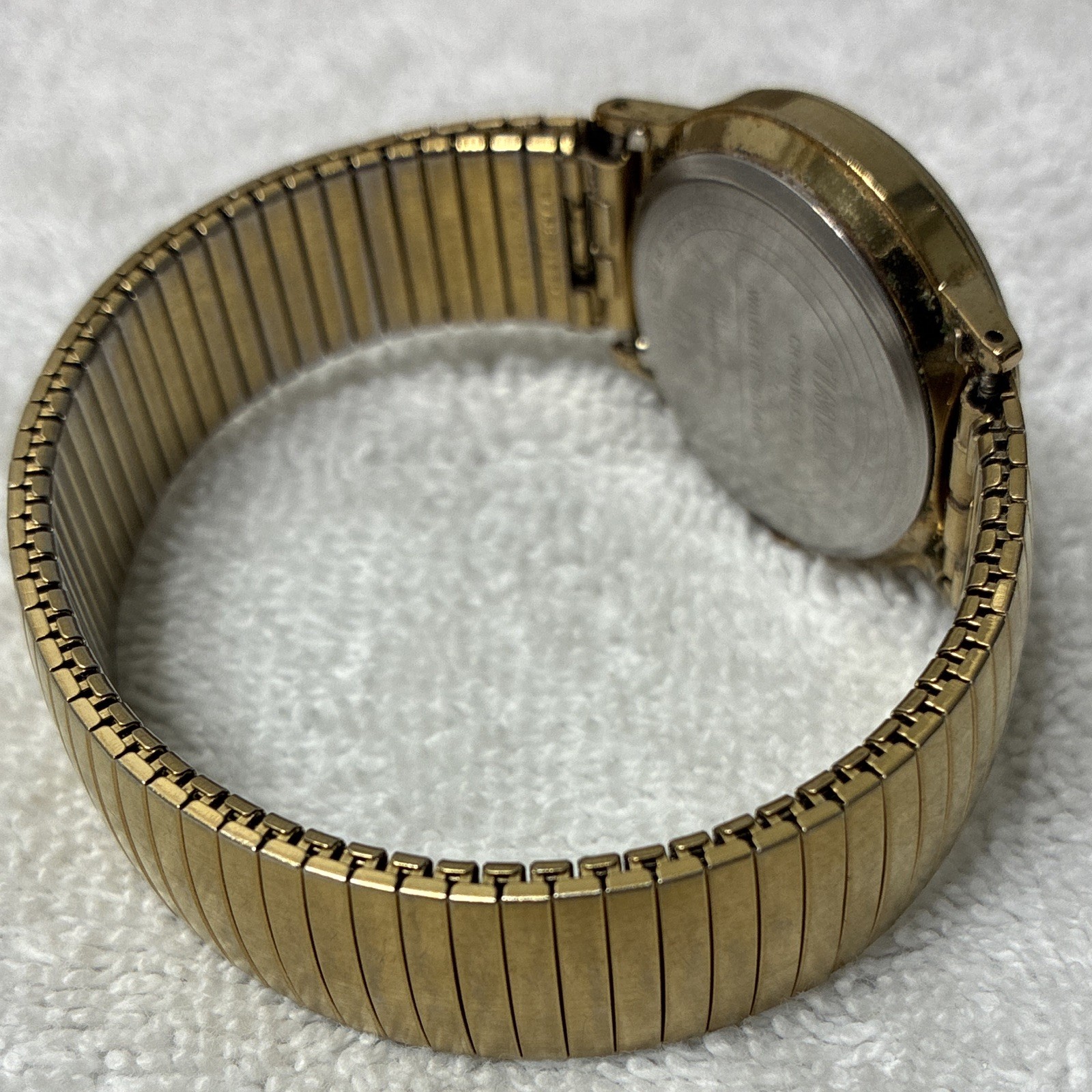 Timex Quartz Men’s Day/Date 34mm White Dial Gold-Tone Metal Bracelet Watch