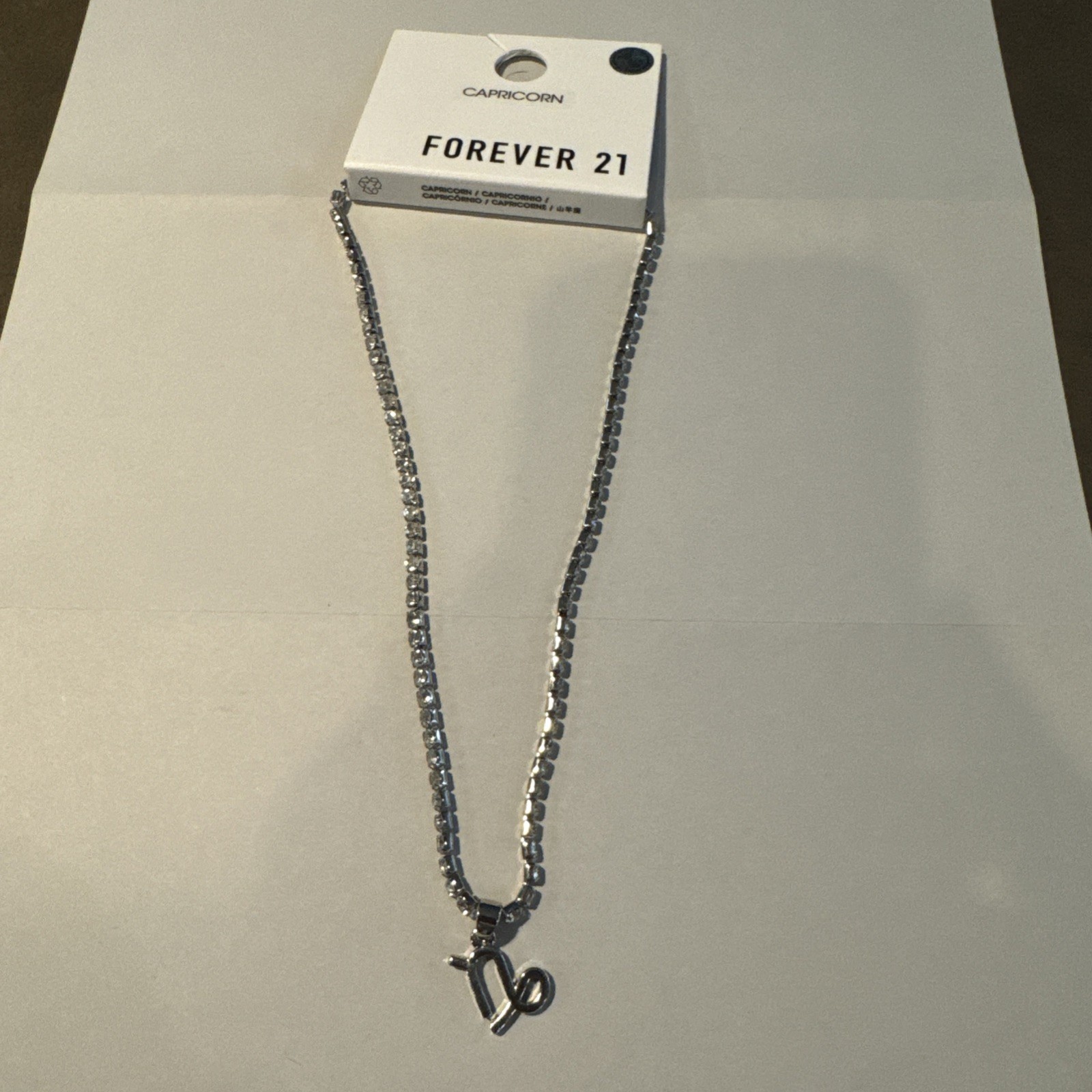 Zodiac sign necklace, silver .