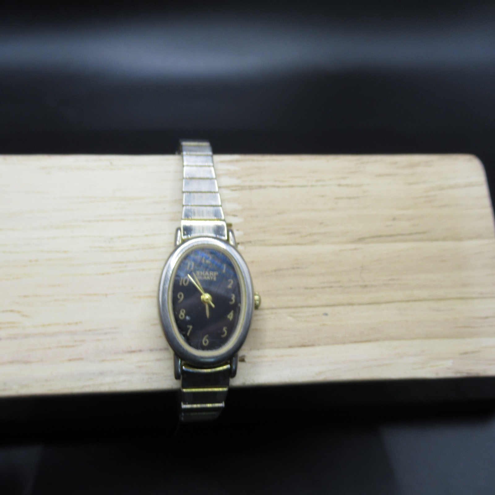 Sharp Quartz Women’s Watch Oval Black Dial Gold Tone Bezel Silver Band Japan