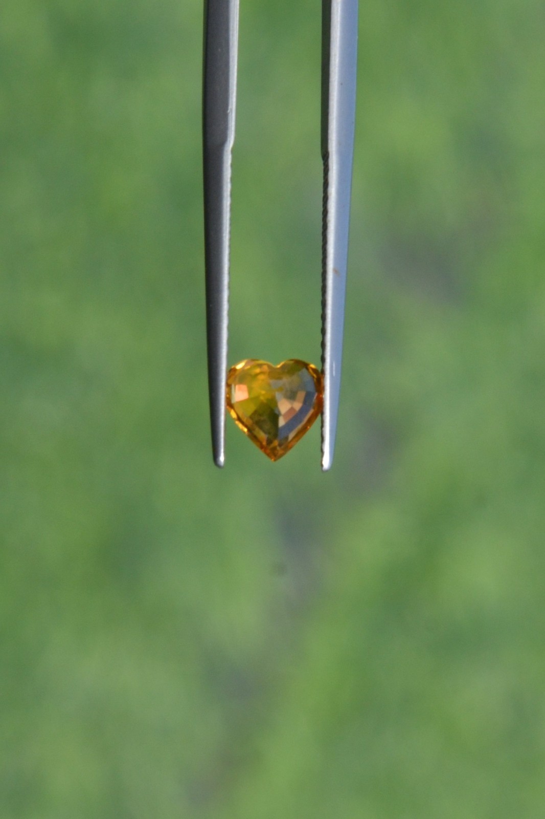 Natural Orange Sapphire 1.06 Carat. BE. Heated Heart Step Cut