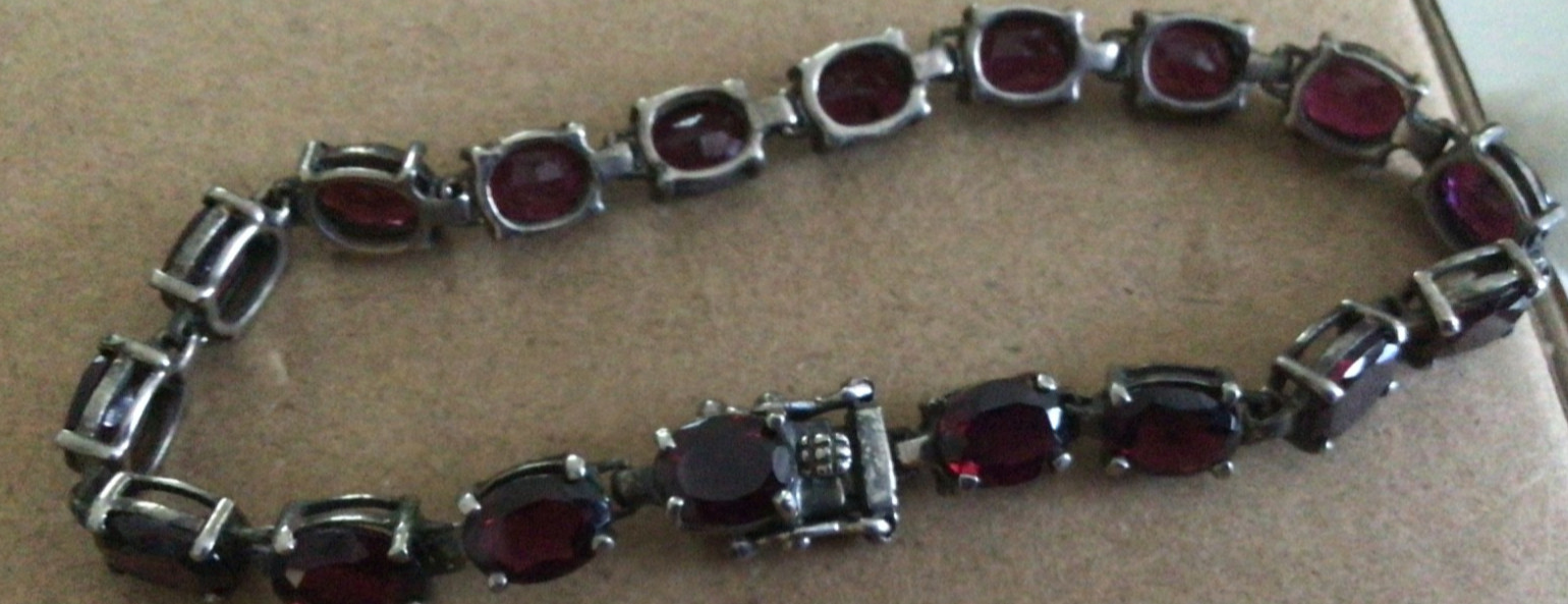 STERLING SILVER & GARNET 8” BRACELET – MARKED 925 CNA THAILAND