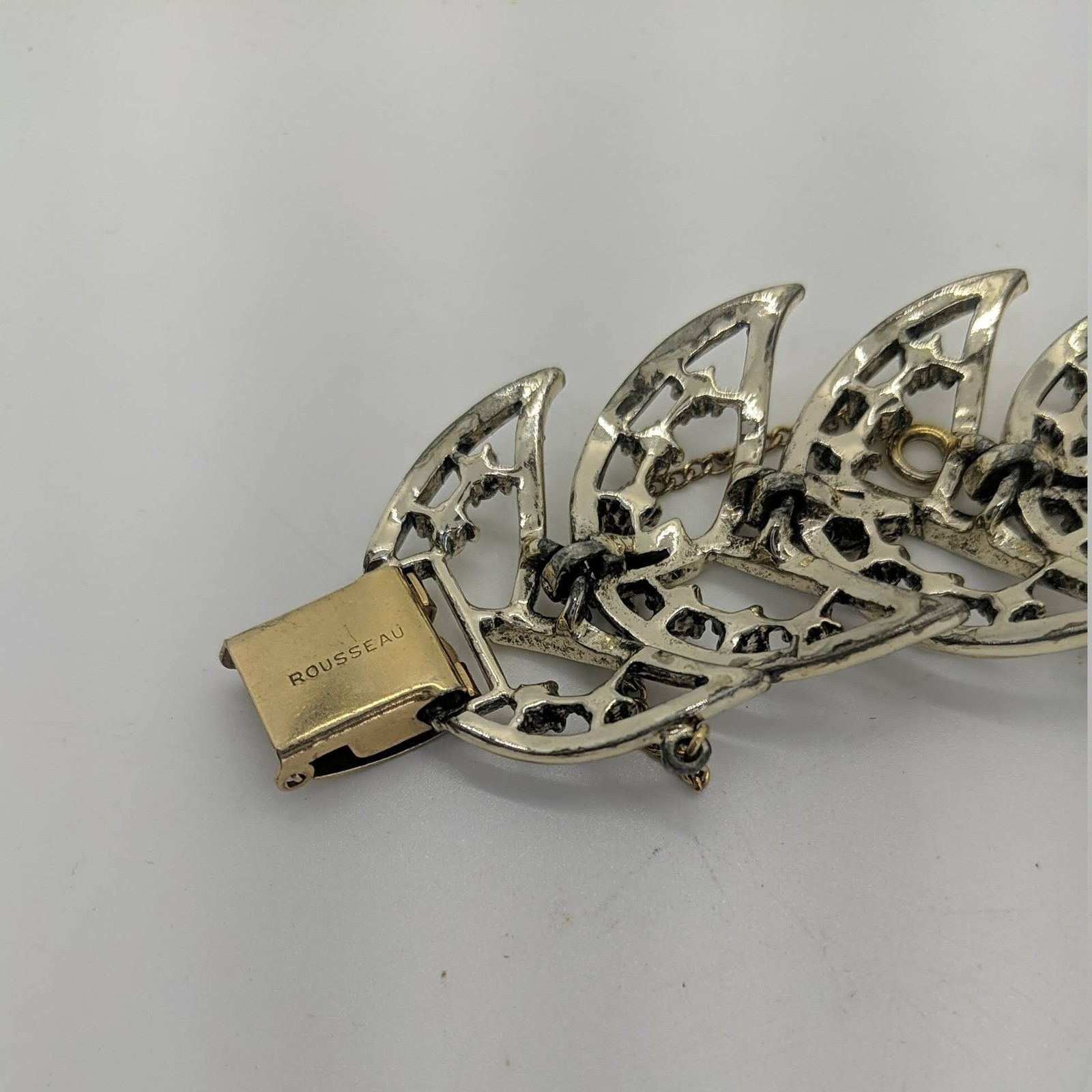 Rousseau Link BRACELET Gold Tone Panels Tail Leaf Fold Over Clasp Safety Chain