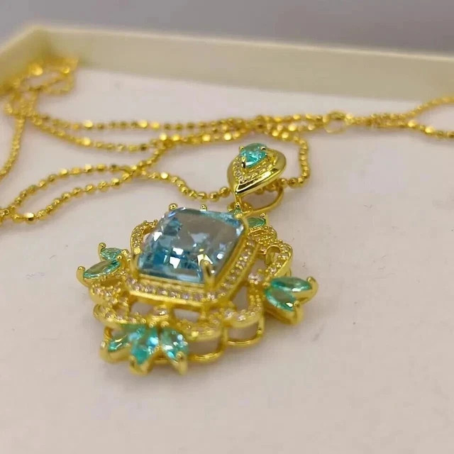 3 Ct Oval Lab Created Blue Topaz Women’s Art Deco Pendant 14K Yellow Gold Plated