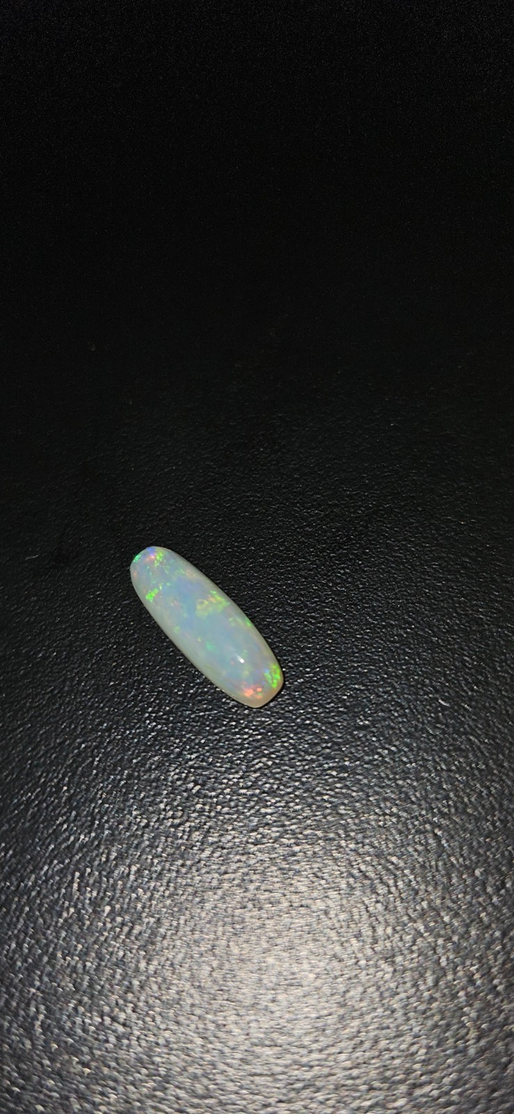 Long Cushion Cut Natural Crystal Opal. 1.18 Carats 12mm x 4mm x 3mm
