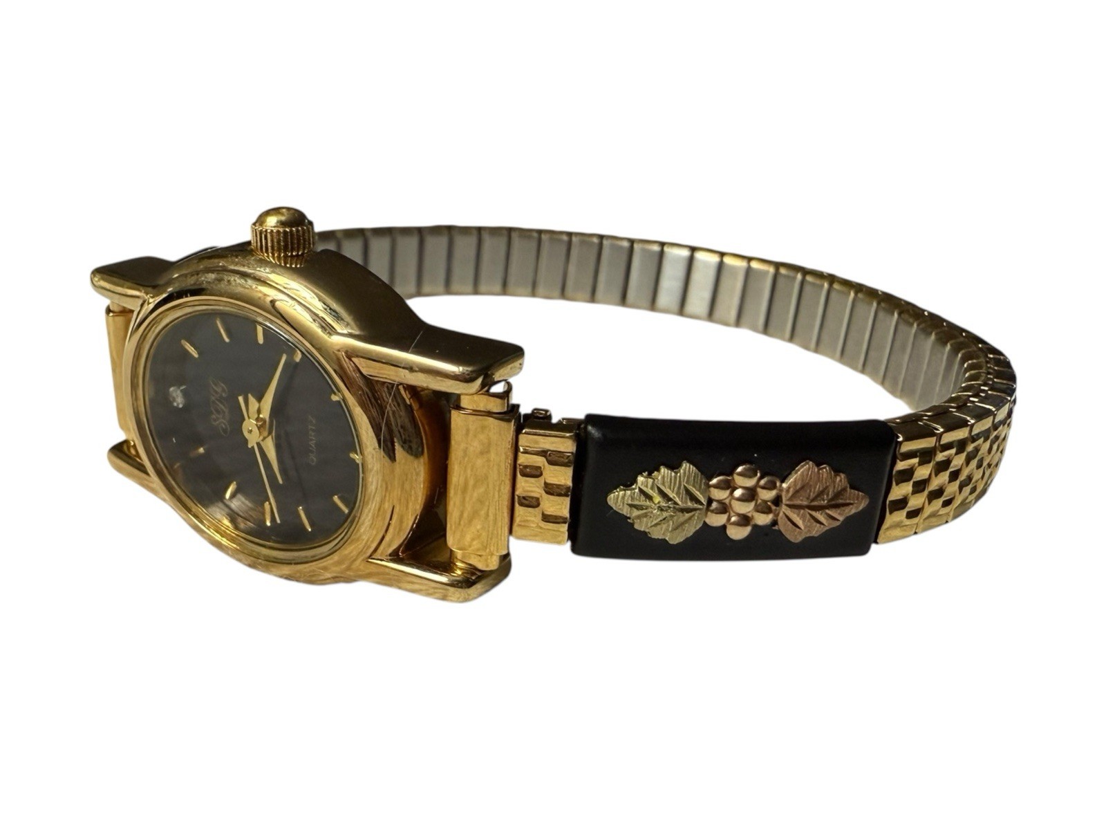 Ladies NOS Retro Vintage Black Hills Gold Stainless Steel Analog Wristwatch