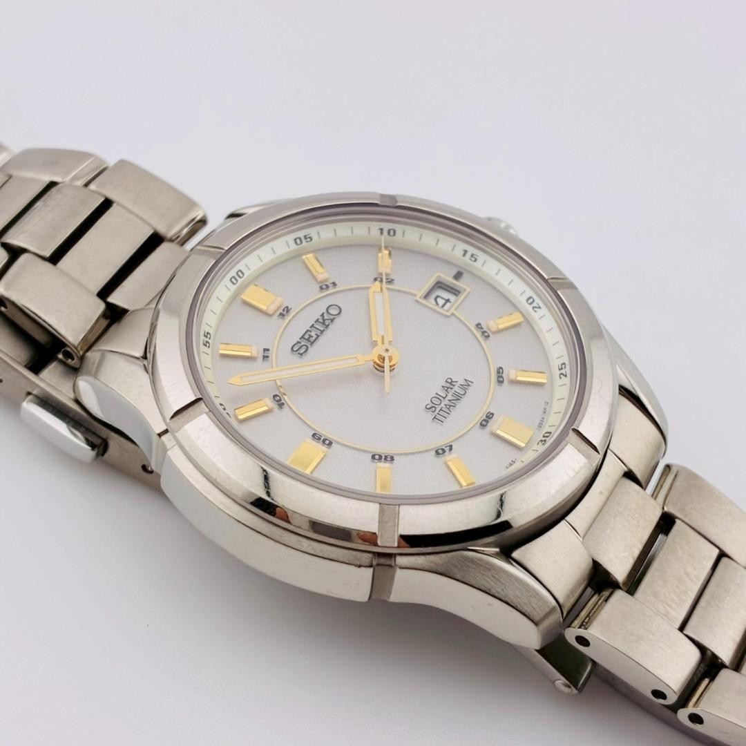 SEIKO Men’s Watch, Date Display, Original Strap, Solar Powered, Titanium