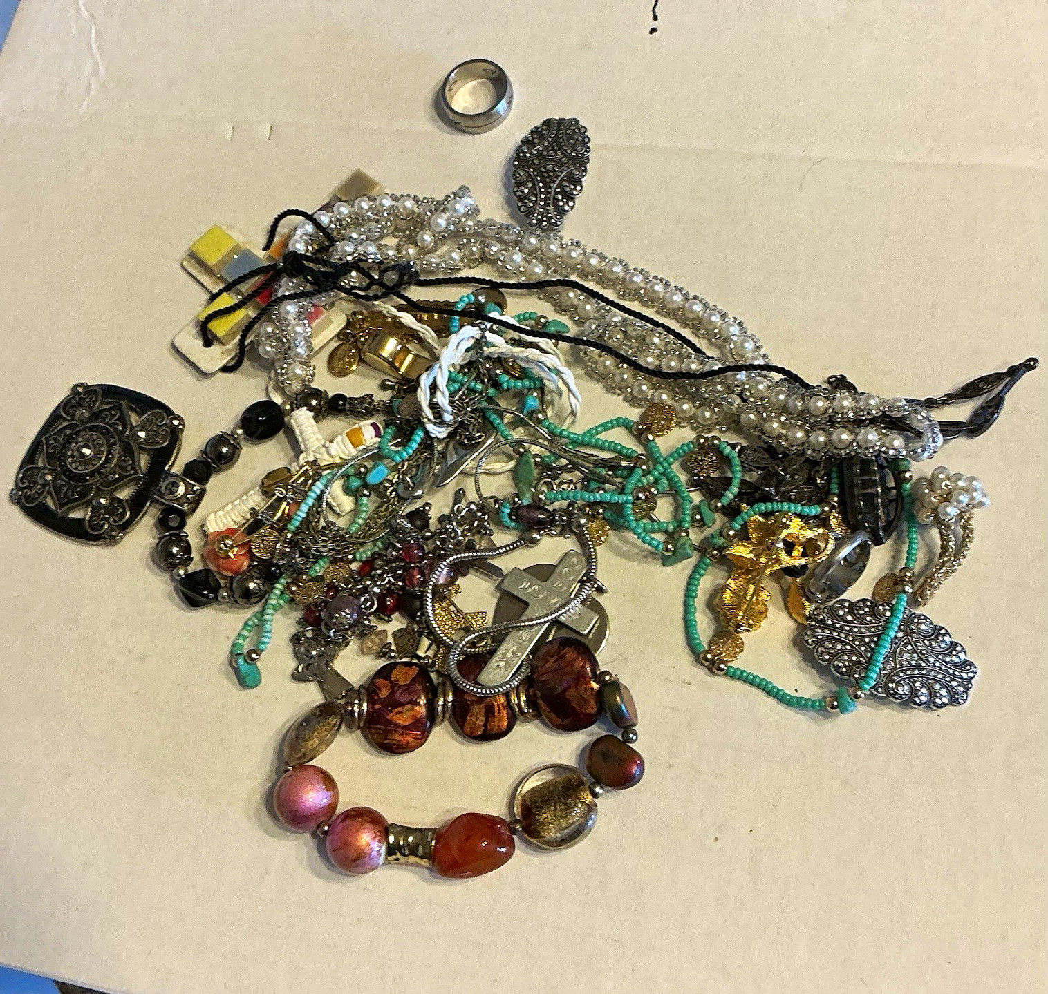 random lot of jewelry ( necklaces bracelets rings etc)