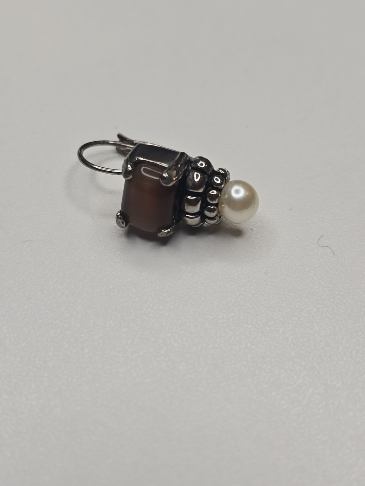 sterling silver Lagos earrings, smoky quartz stone and pearl accent.