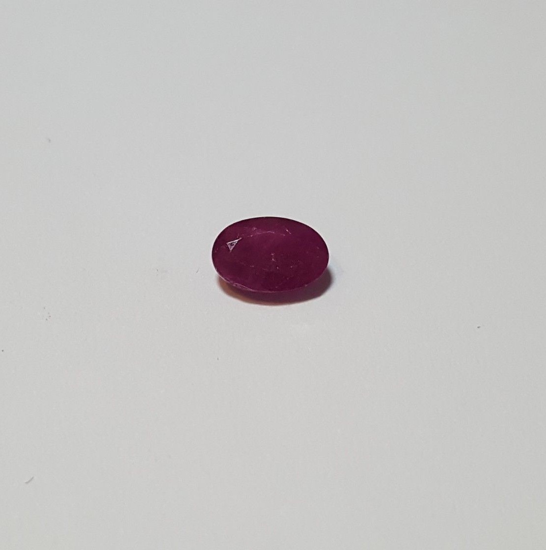 Oval shaped ruby. 6x4mm oval shaped genuine red ruby.