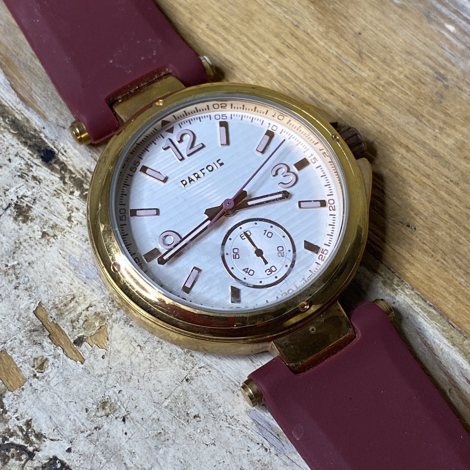 Parfois Elegant Gold Tone Ladies Watch With Center Subdial And Silicone Band