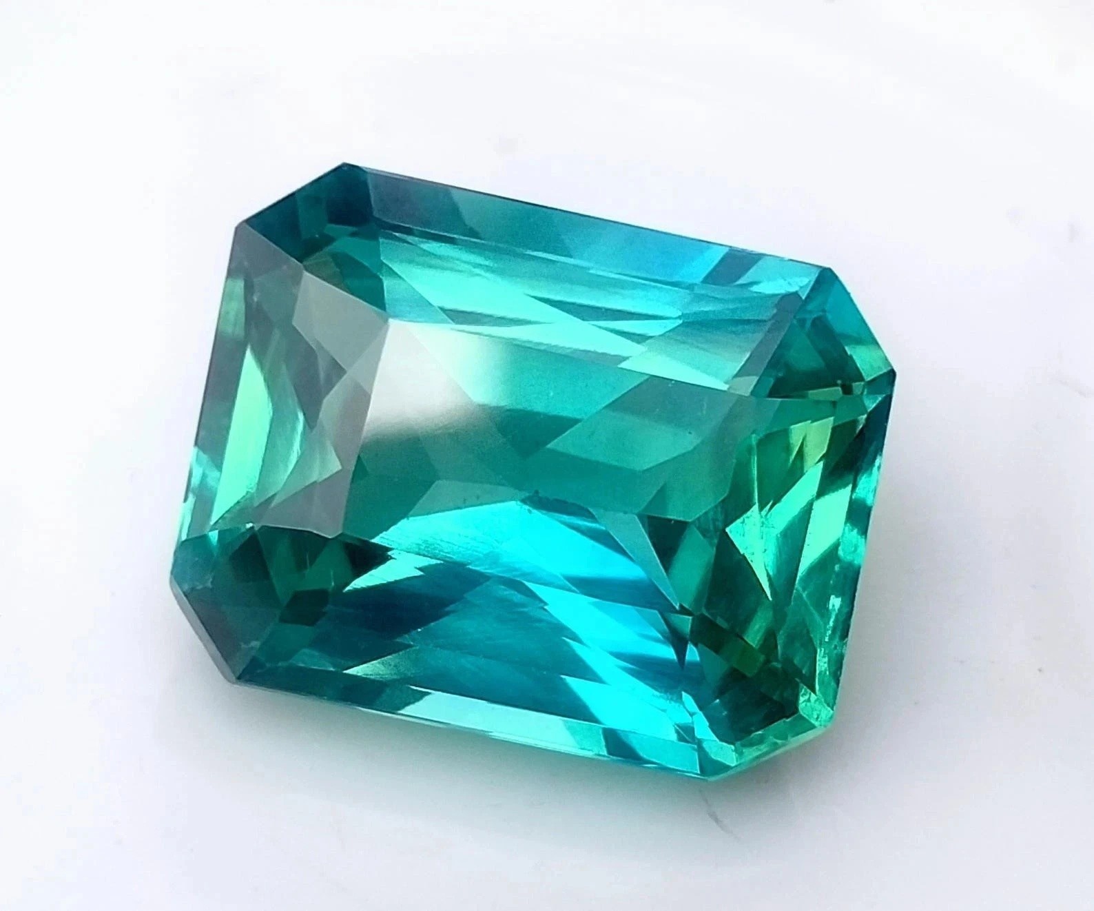 AAA 9.45 Ct Certified Lab-Created Bluish Green Grandidierite Emerald Cut Gems