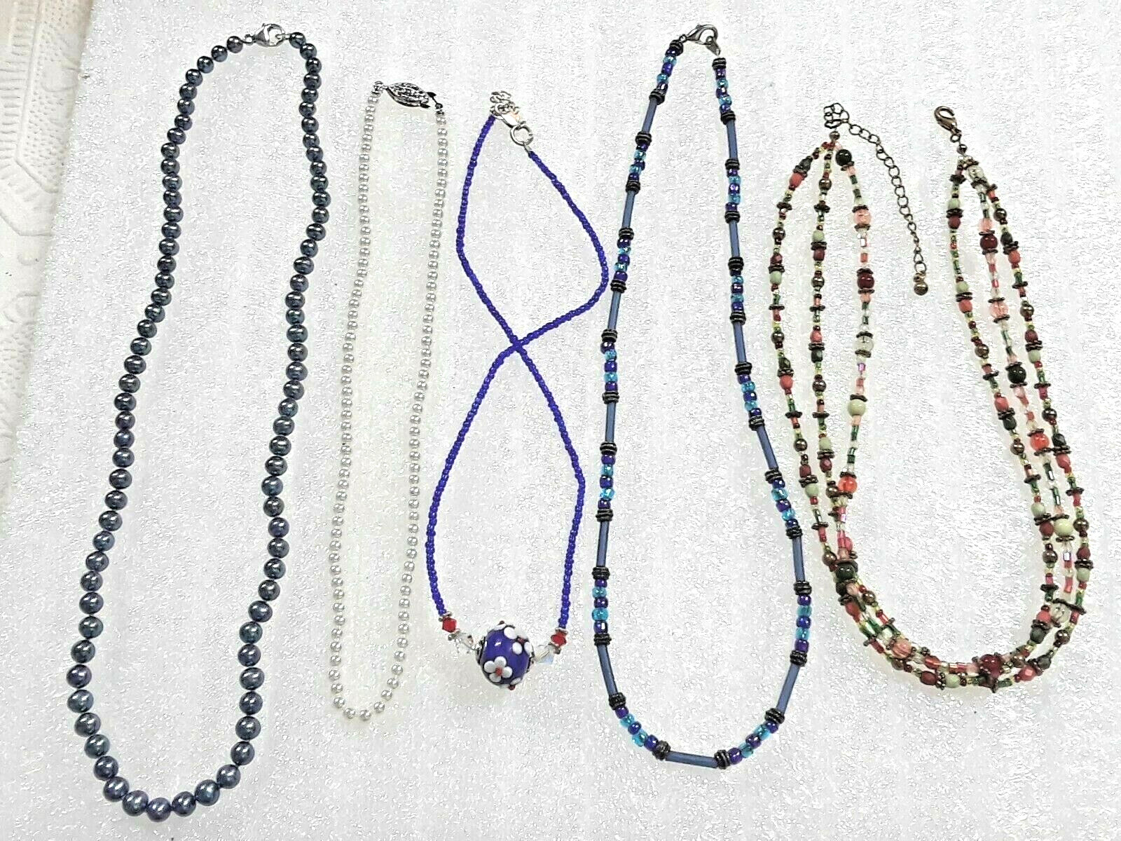blue pearl necklace, multi-color beads, art glass pendant, and more.