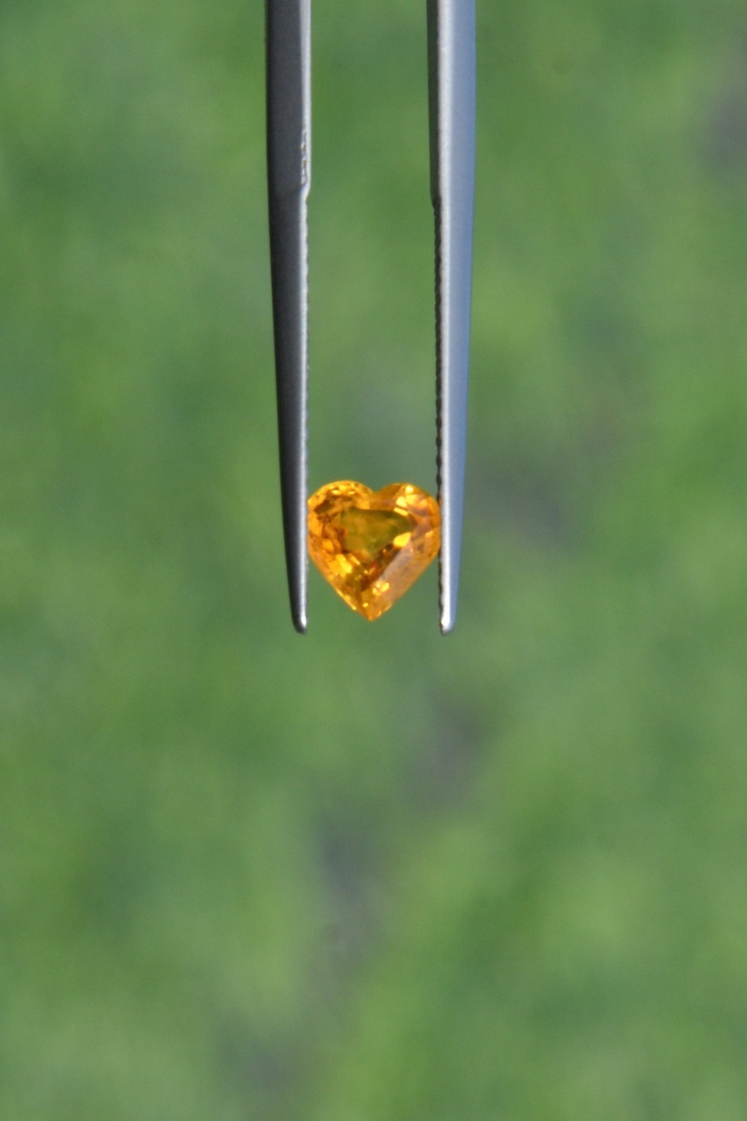 Natural Orange Sapphire 1.06 Carat. BE. Heated Heart Step Cut