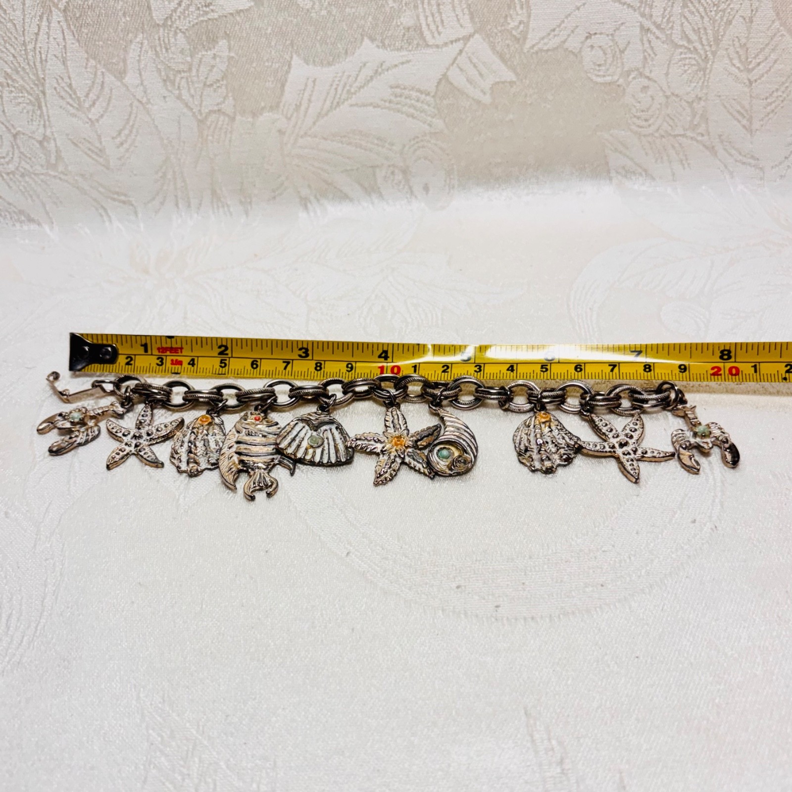BRACELET ocean life charms starfish shells fish lobster fold over clasp vintage