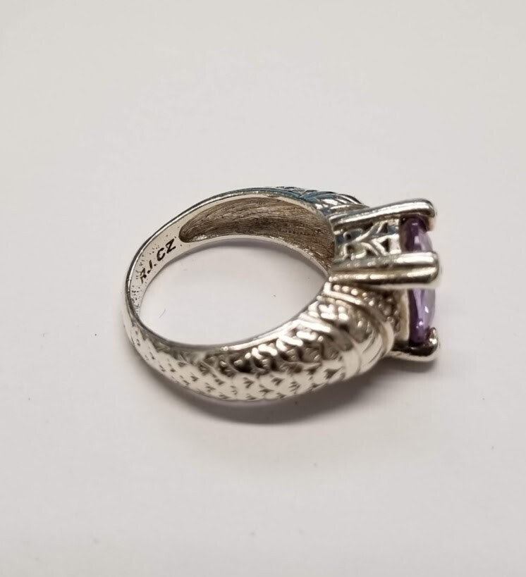.925 STERLING SILVER RING WITH EMERALD CUT LAVENDER STONE SZ 8 8.6 GR. #5741
