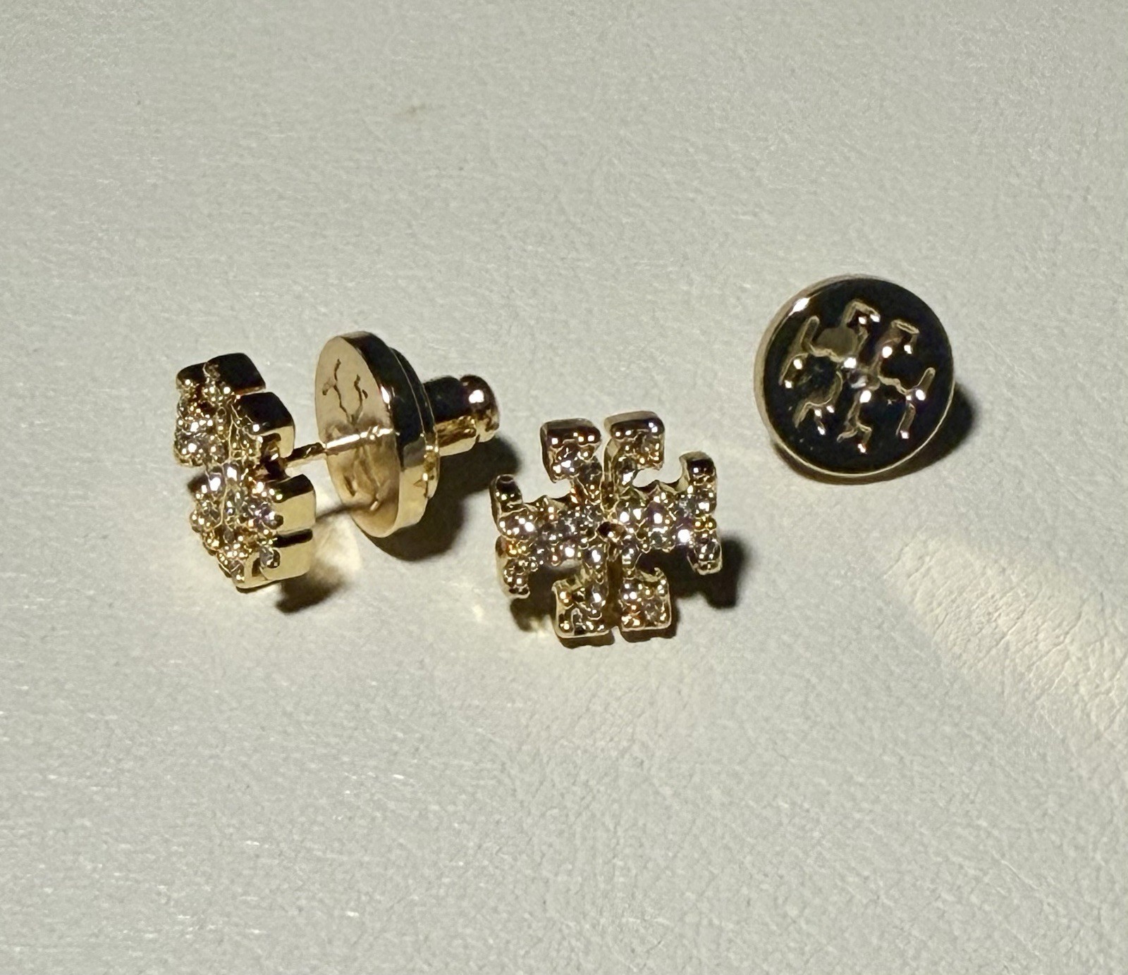 Tory Burch Women’s Gold-Tone Pavé Crystal Logo Stud Earrings.