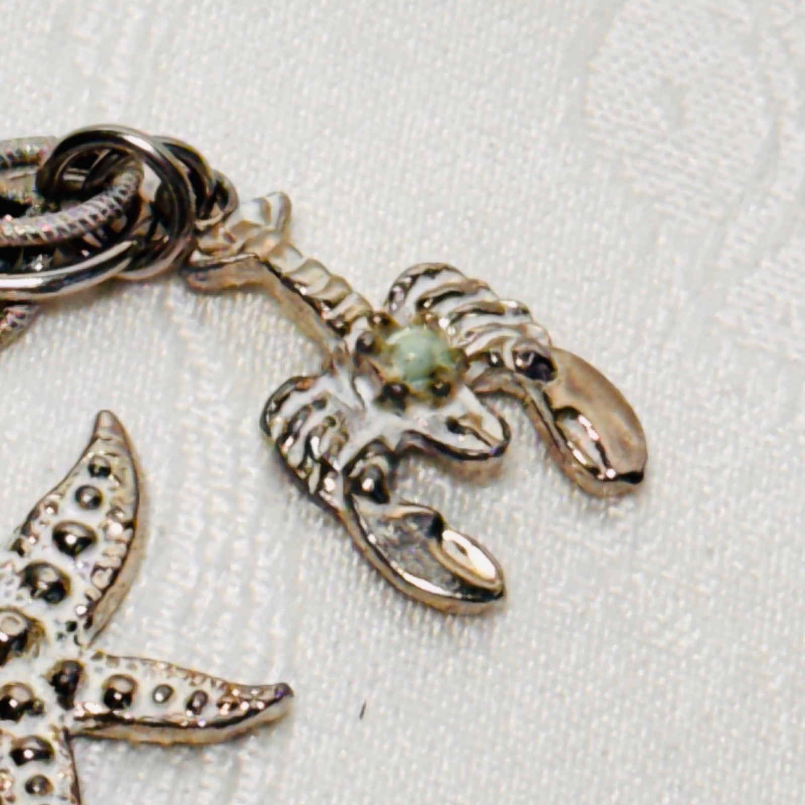 BRACELET ocean life charms starfish shells fish lobster fold over clasp vintage