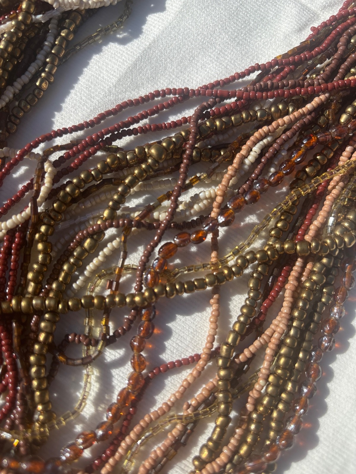 Multi strand necklace /women /glass/ fall colors/size 19”-24”/worn once/ lovingl