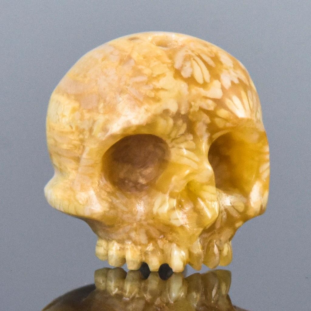 13.98mm Human Skull Bead Carved Agatized Fossil Coral Bead Vertical drilled 3.1g