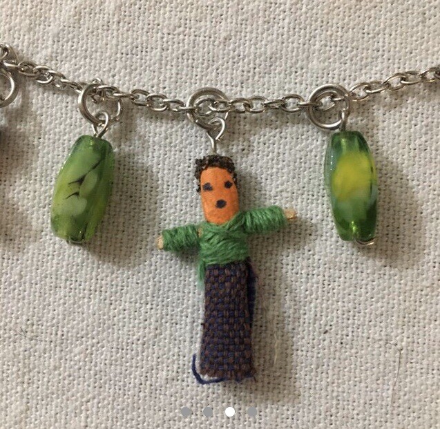 Necklace Teen Or Women’s With Green Beads And Trouble Dolls. Silver Chain.