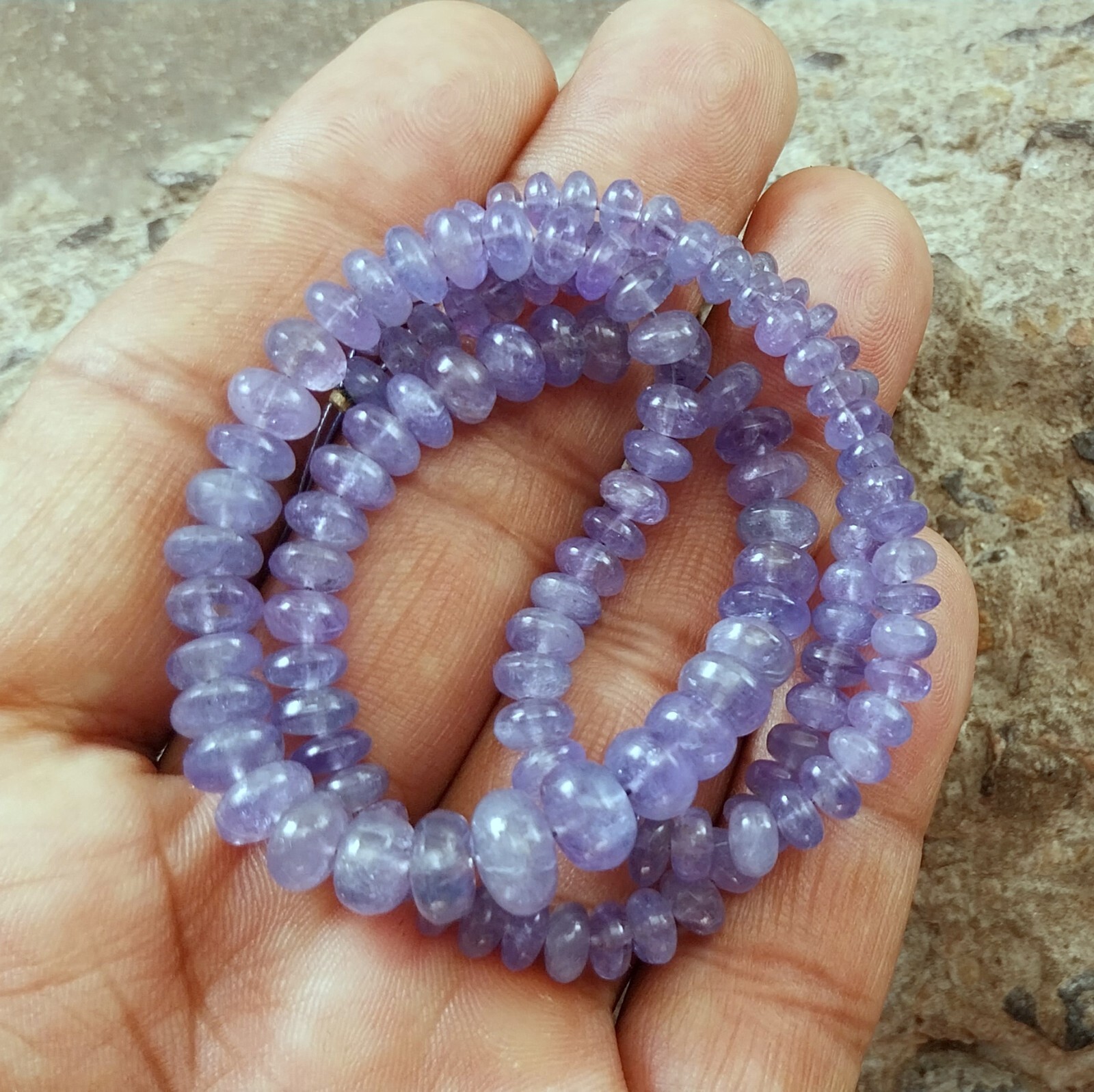 141 Carat 4.5 to 8 MM Natural Light Blue Color Smooth Tanzanite 17 Inch Beads