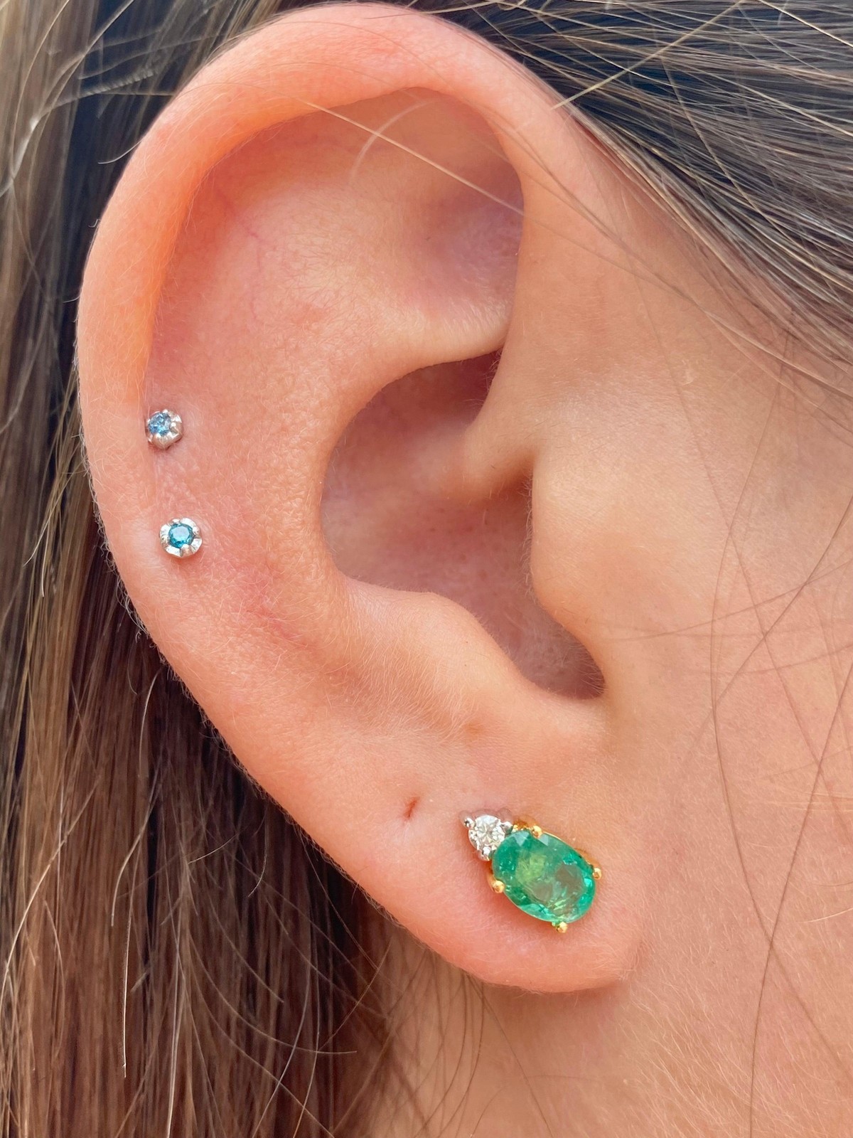 1.5 CTW Oval Cut Emerald Stud Earrings & Diamond Tops in 14K Gold