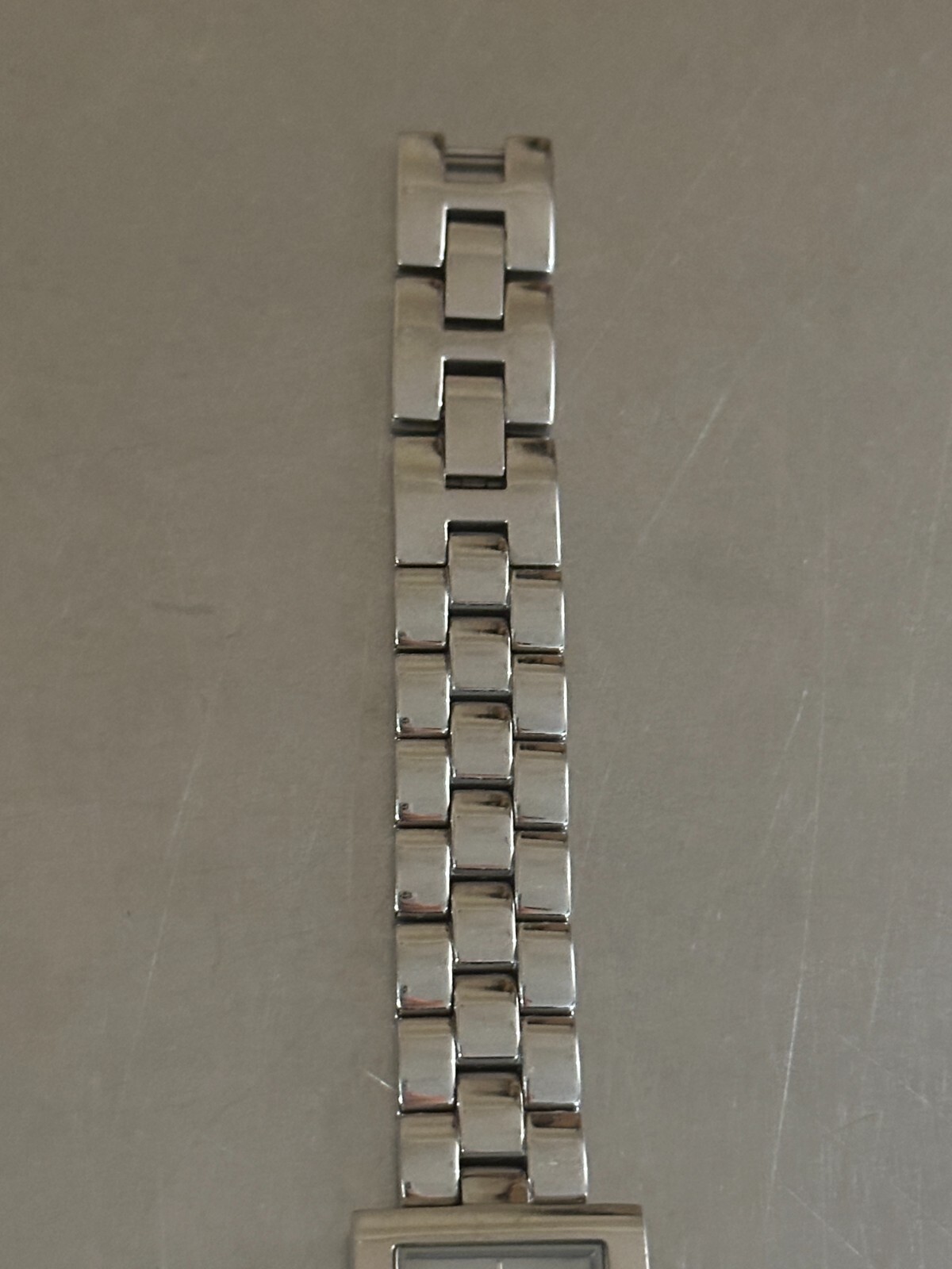 DKNY Watch Women’s Analog Square Silver Tone Quartz Water Resistant 7 inch 22 mm