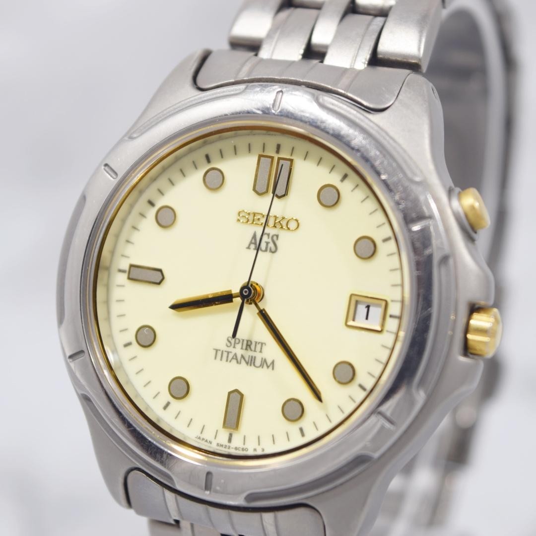 1996 SEIKO Spirit AGS Titanium watch with date display, non-functional.