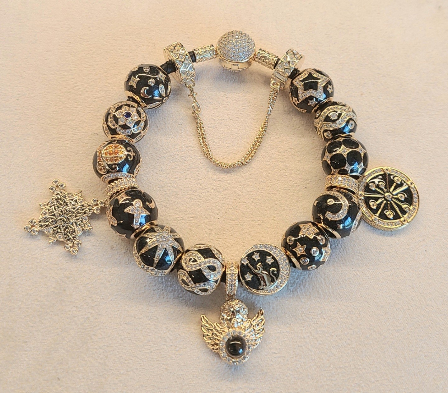 GONA Black Leather Cord Bracelet With Assortment Of CZ And Enamel Charms. 7.7″