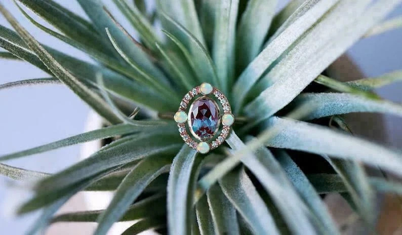 2.50Ct Oval Cut Lab-Created Opal Bezel Set Engagement Ring 14K Rose Gold Over