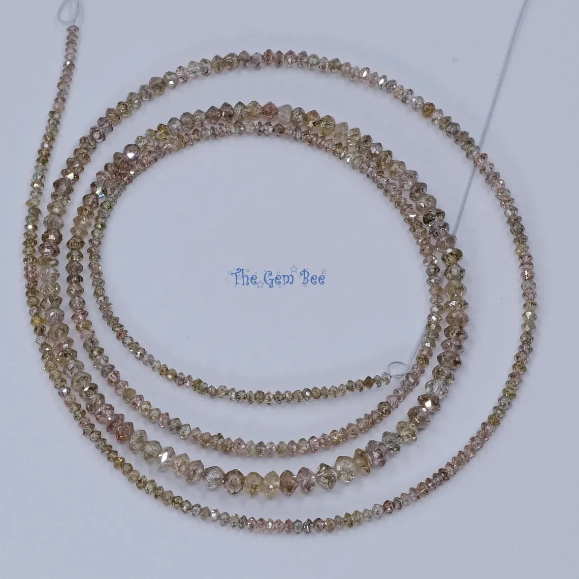 1.3mm-3mm Natural Pinkish Brown Champagne Diamond Faceted Rondelles Beads18″ Str