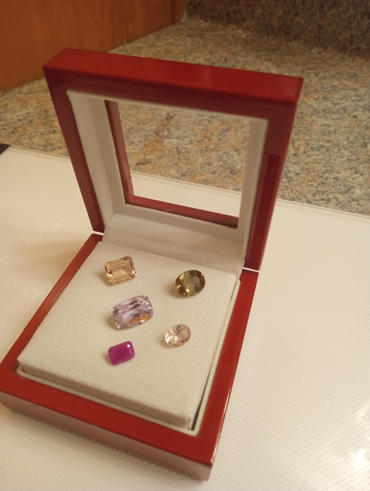 Lot of 5 Loose Cut gems. 1 Ruby, 2 Morganites, 1 Andelusite and 1 Kunzite.