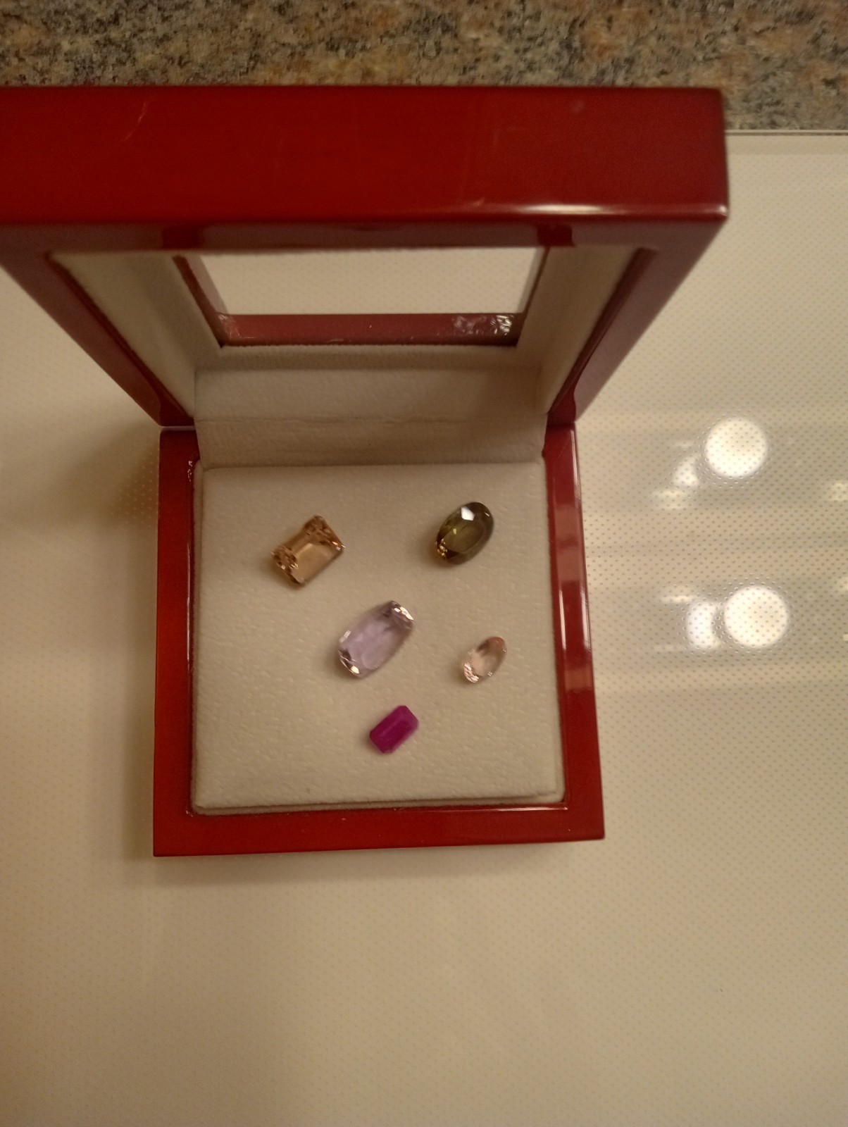 Lot of 5 Loose Cut gems. 1 Ruby, 2 Morganites, 1 Andelusite and 1 Kunzite.