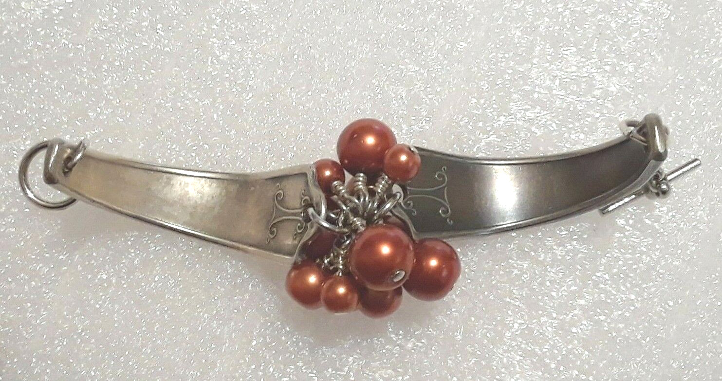 Spoon handle Bracelet. 2 piece with toggle clasp and burnt orange beads.