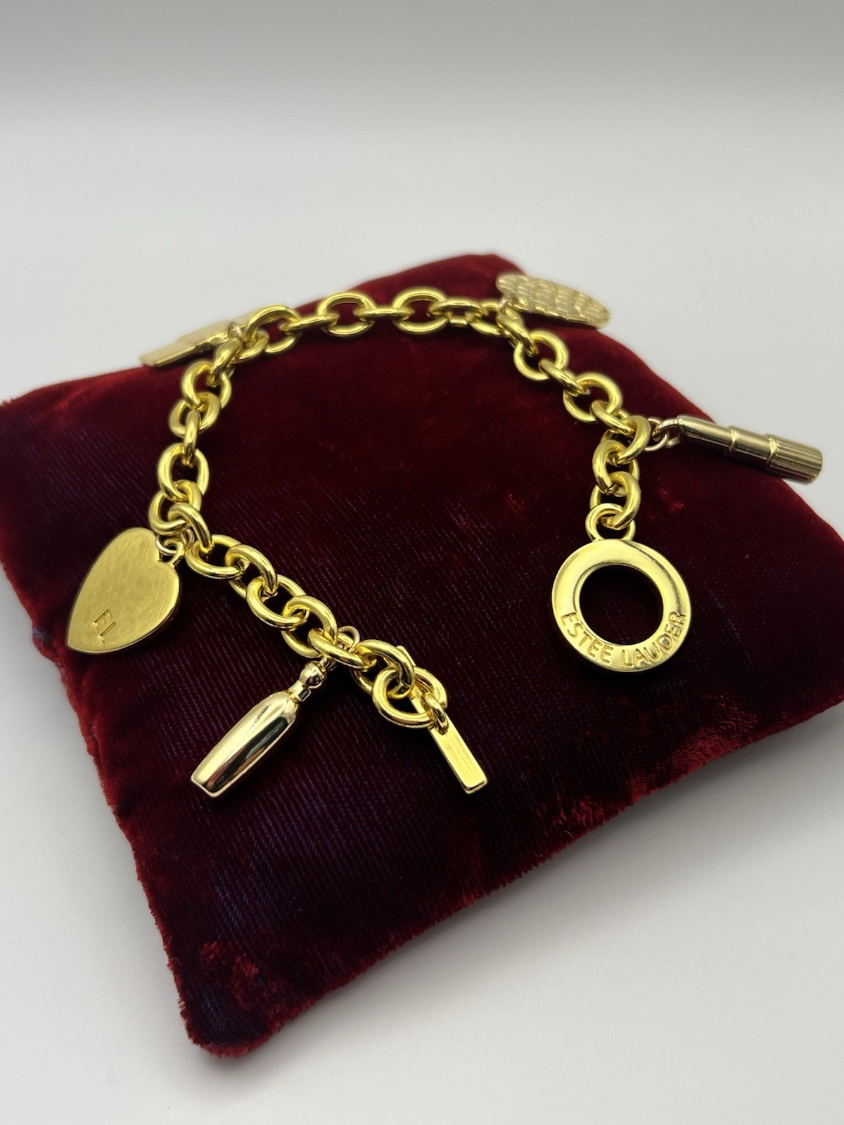 Vintage ESTEE LAUDER Runway Gold Tone Charm Bracelet Couture 7.5 ”