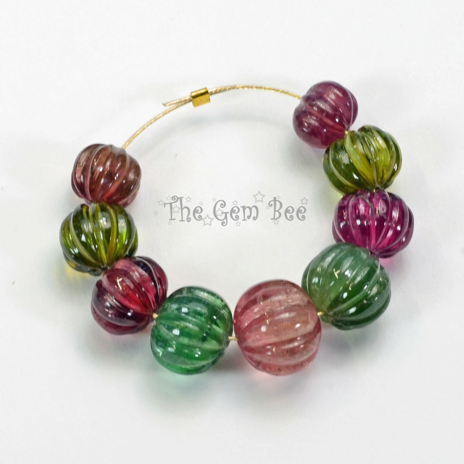 7.8mm-10.6mm Fine Candy Tourmaline Carved Melon Fluted Bead 2.7″ Strand (9)