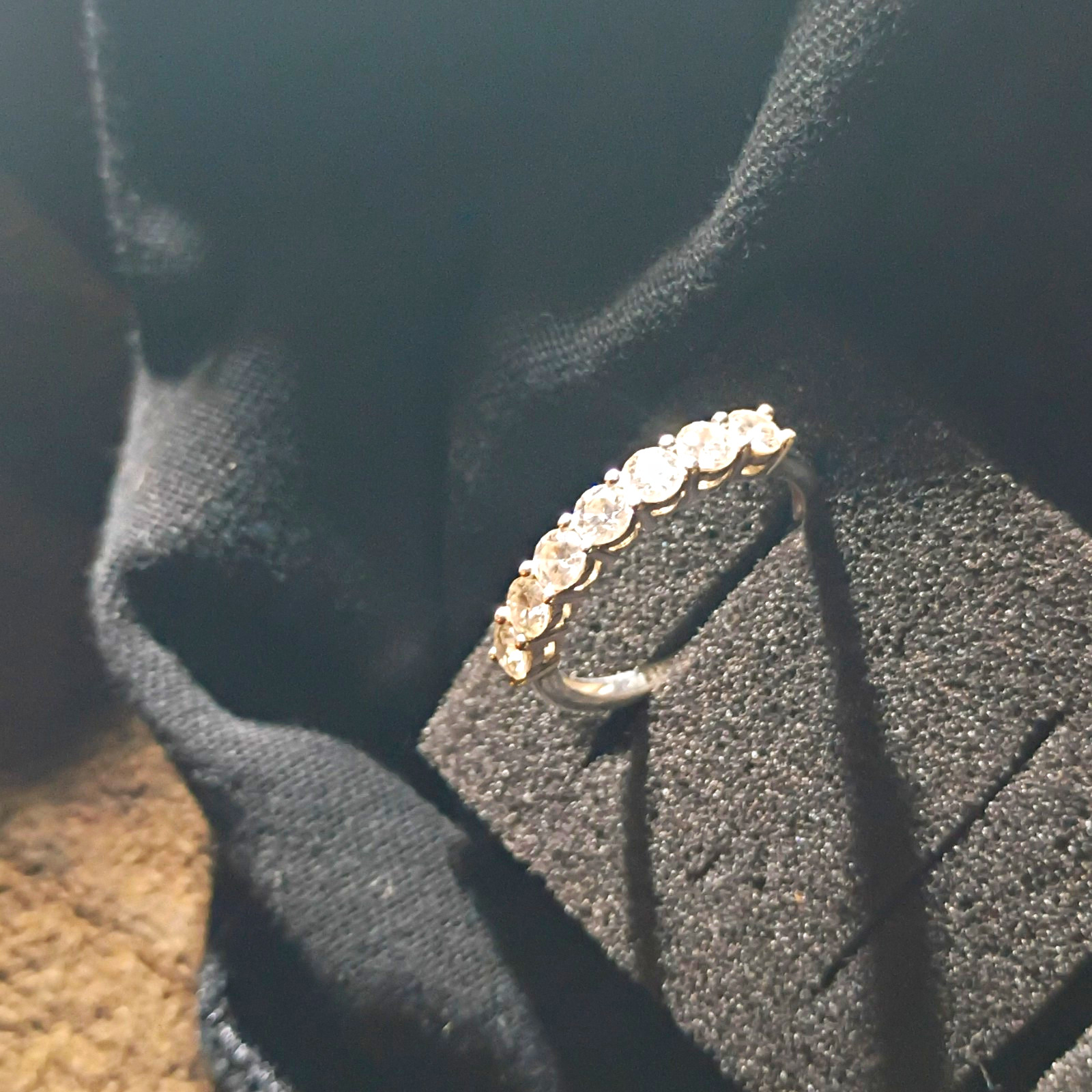 Silver Tone Metal Signed Eternity Band Ring Clear Round Stones Prong Size 7