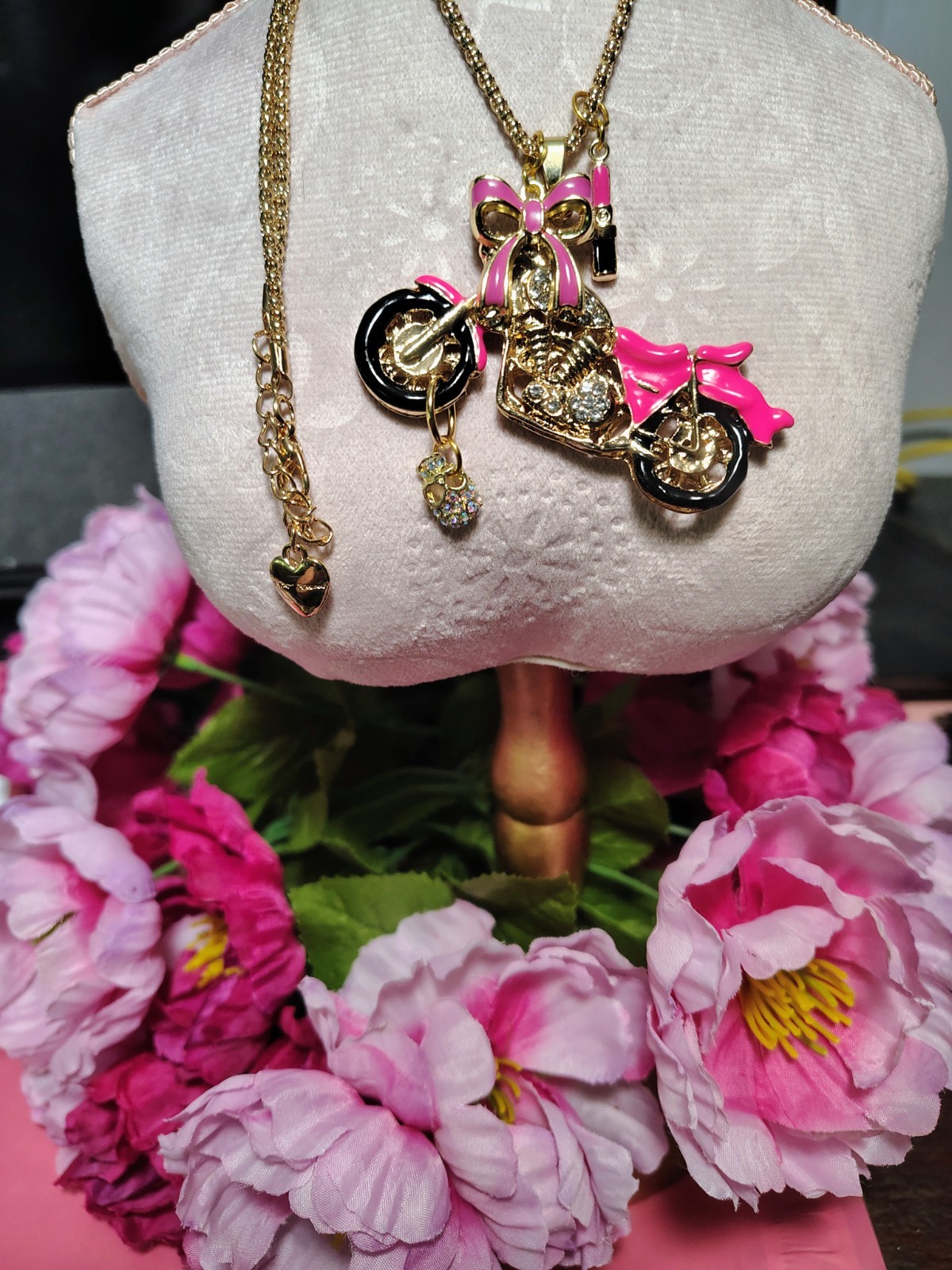 Betsey Johnson Pink Rhinestone motorcycle with BOW, SKULL, And LIPSTICK charms