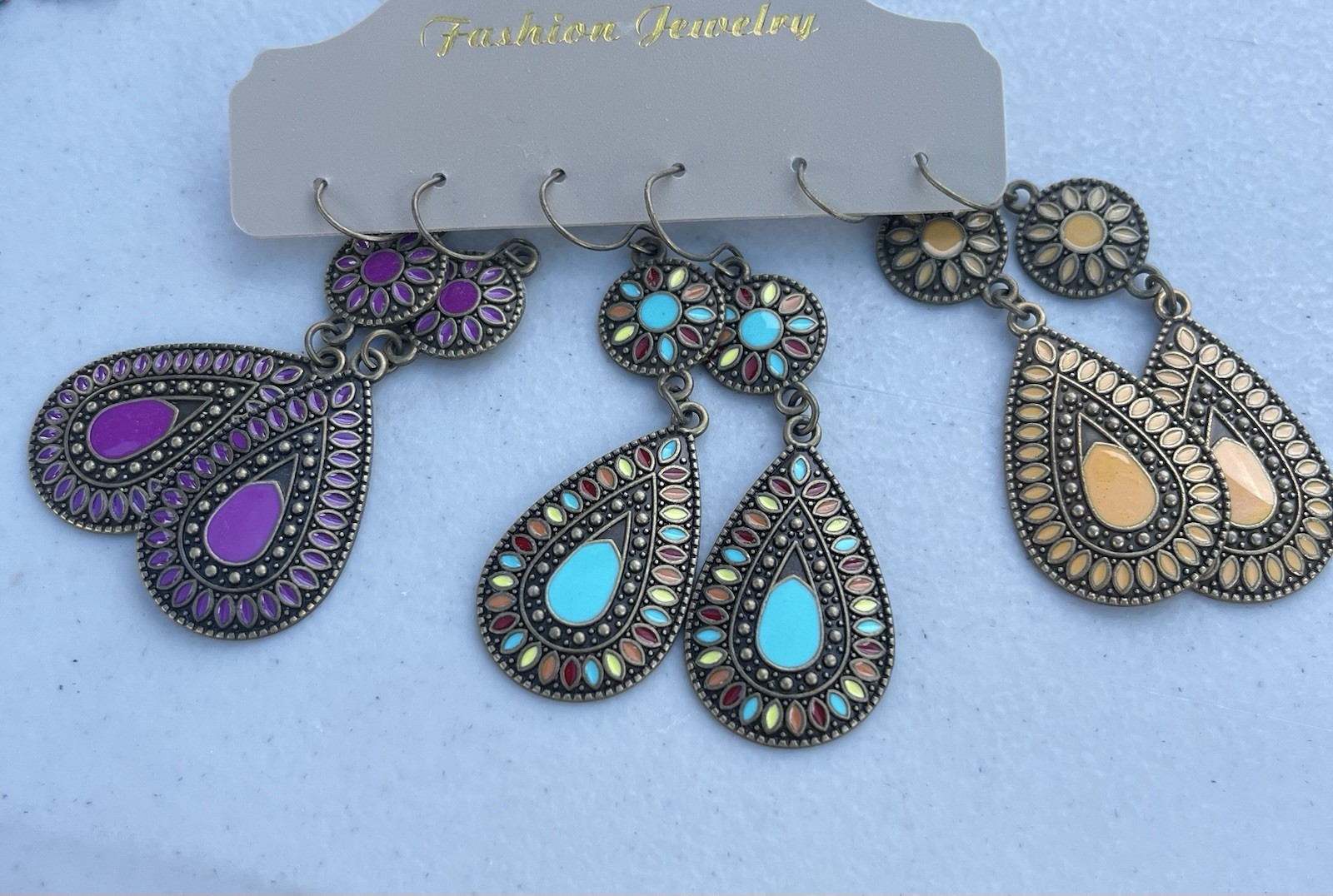 12 pair Bohemian dangle Turquoise/ bronze earrings- brand new