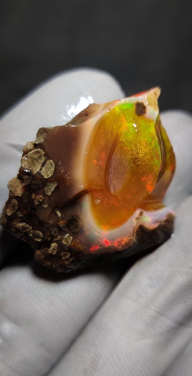 23ct natural ethiopian opal welo rough intense multi color play of fire gemstone