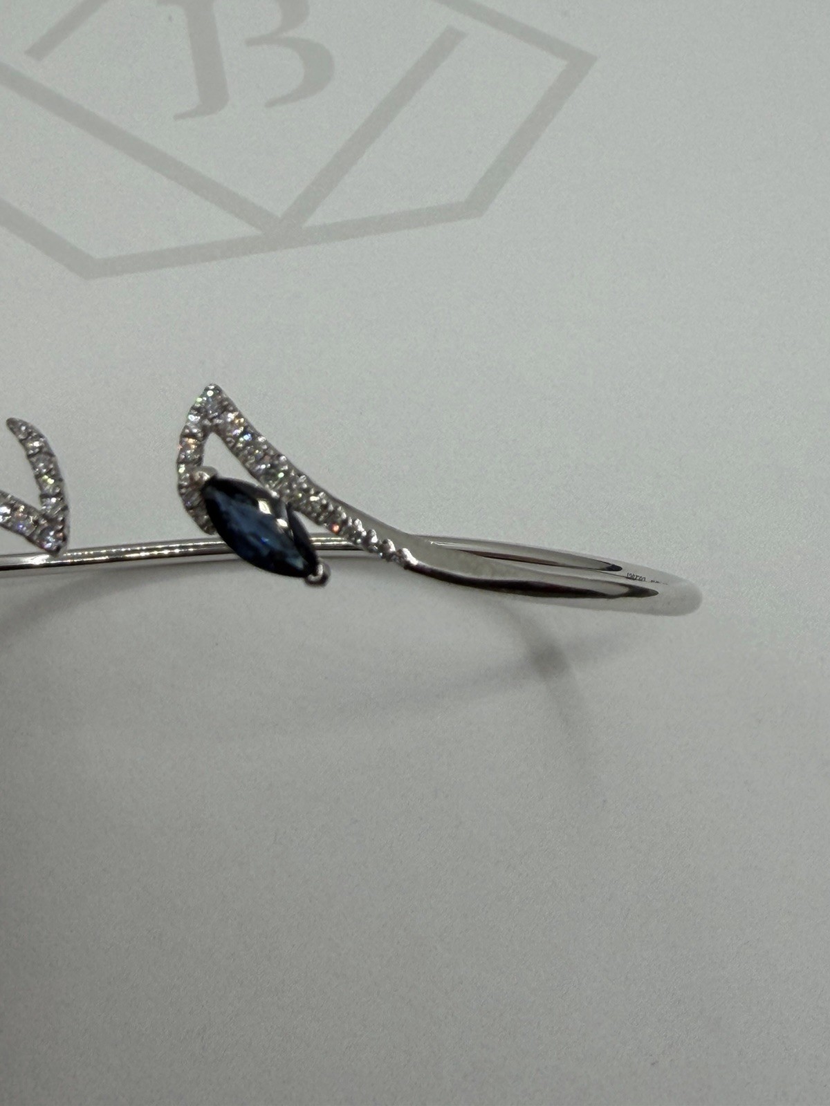 Appraised 18k white gold diamond Sapphire Contoured 5.2 Grams bangle bracelet